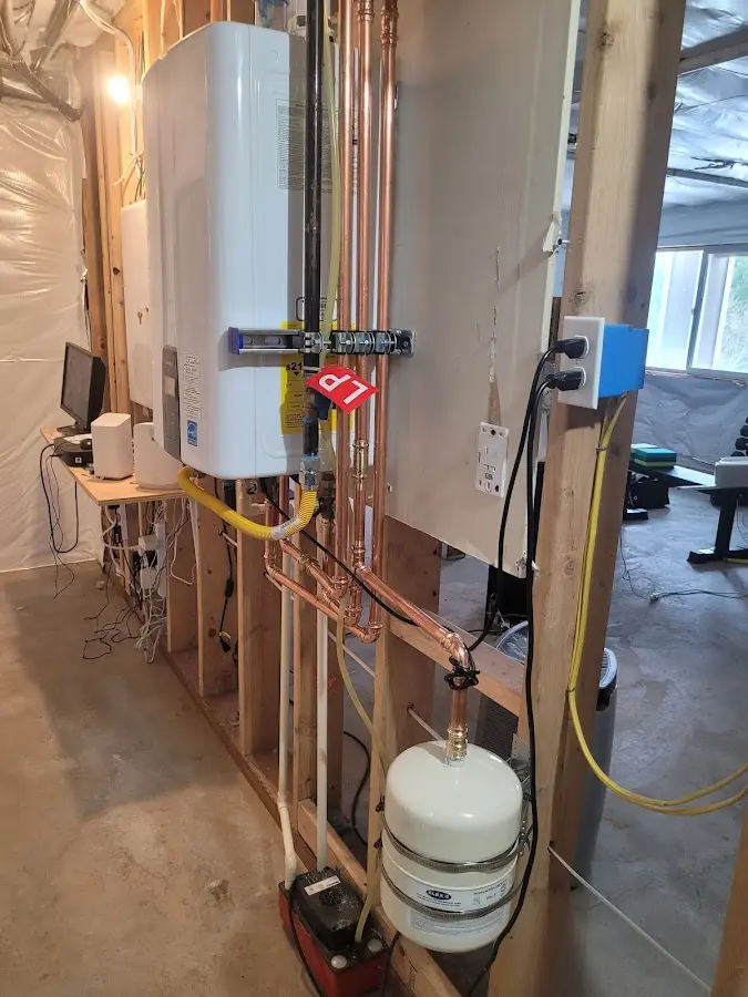 Licensed plumber repairing a kitchen sink in Washington